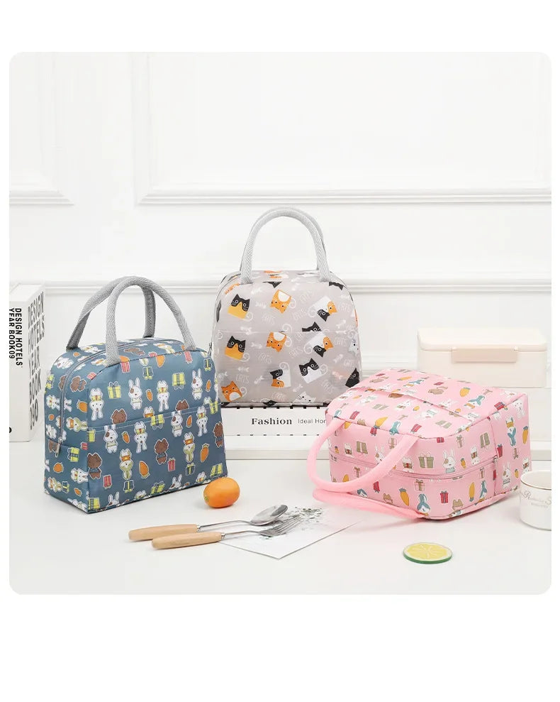 Sac à lunch isotherme à motif dessin animé (1 pièce), idéal pour les pique-niques, les sorties scolaires et les bentos. Grande capacité.