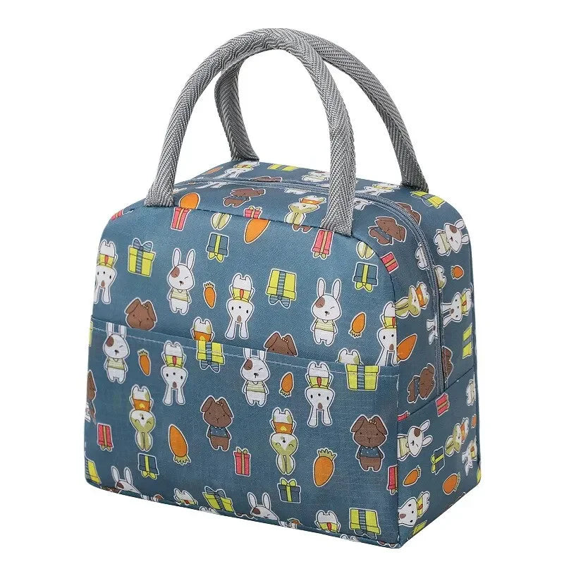 Sac à lunch isotherme à motif dessin animé (1 pièce), idéal pour les pique-niques, les sorties scolaires et les bentos. Grande capacité.