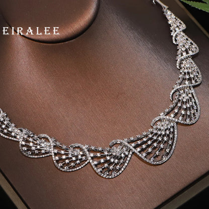 EIRALEE Nouvelle parure de bijoux pour femmes, collier et boucles d'oreilles en zircone cubique. Parure de bijoux de mariée, accessoire idéal pour un bal, un mariage ou une fête.