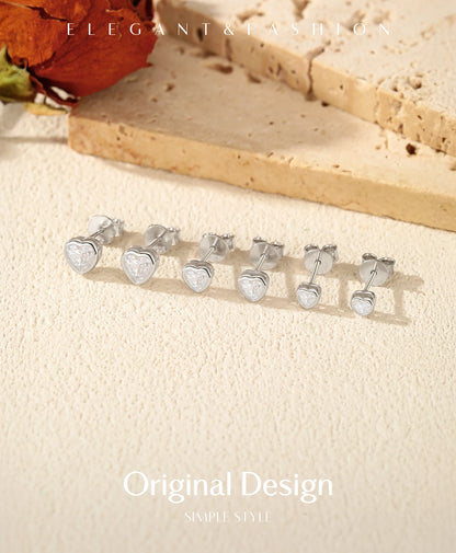 Boucles d'oreilles MODIAN en argent sterling 925, ornées de moissanites en forme de cœur et disponibles en 3 tailles. Bijoux fins et tendance pour femmes.
