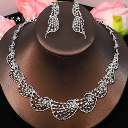 EIRALEE Nouvelle parure de bijoux pour femmes, collier et boucles d'oreilles en zircone cubique. Parure de bijoux de mariée, accessoire idéal pour un bal, un mariage ou une fête.