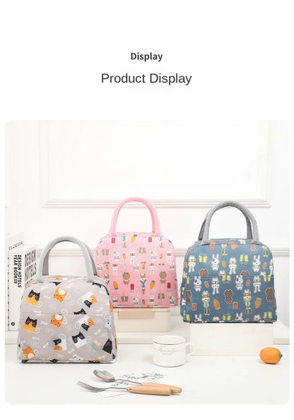 Sac à lunch isotherme à motif dessin animé (1 pièce), idéal pour les pique-niques, les sorties scolaires et les bentos. Grande capacité.